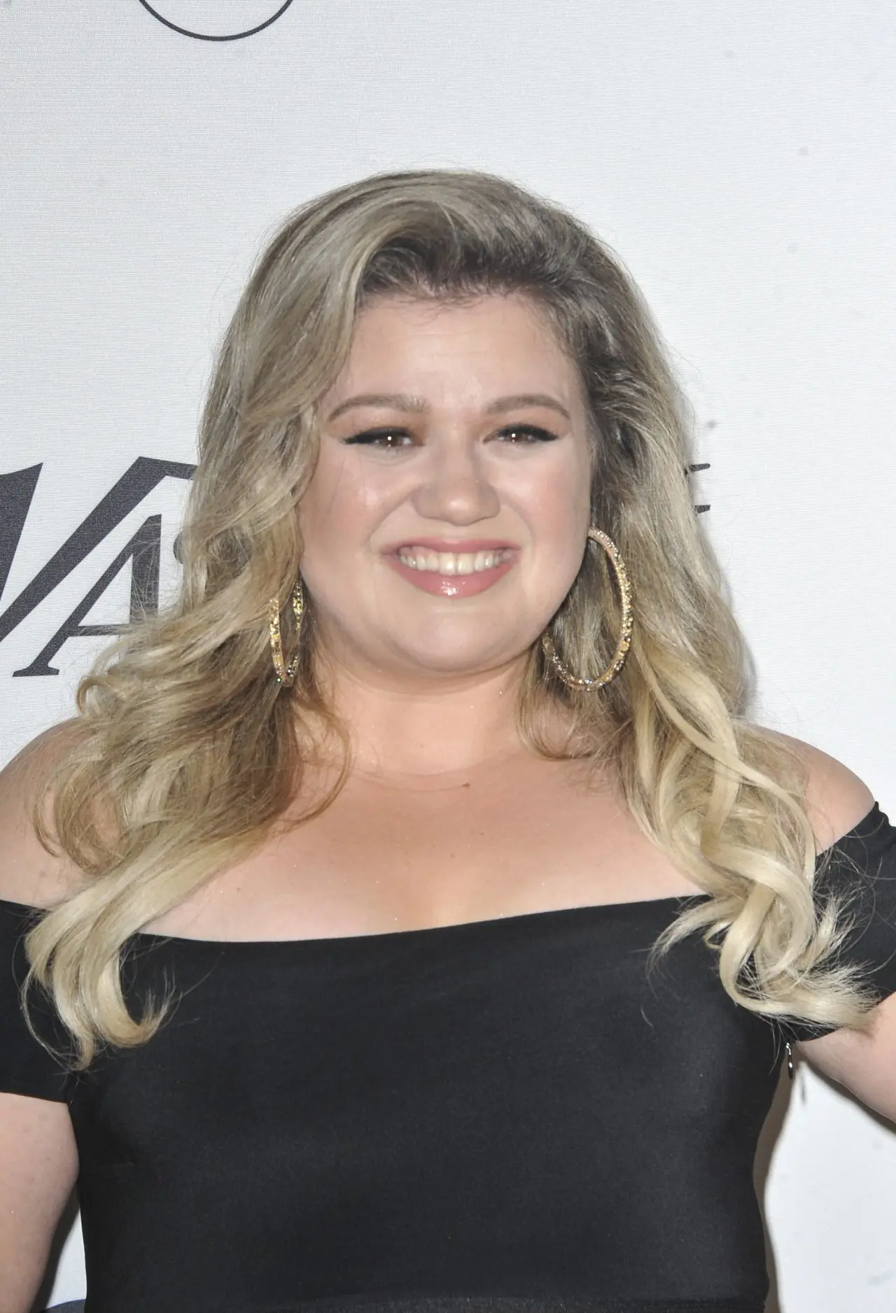 The Rise and Impact of Kelly Clarkson in Entertainment