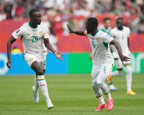 Pape Gueye (left) with Idrissa Gana Gueye after scoring Senegal’s third goal against Iraq in Toronto