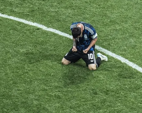 Lionel Messi kneels in rapture